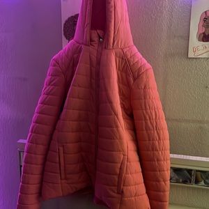 Pink puffer coat for sale.